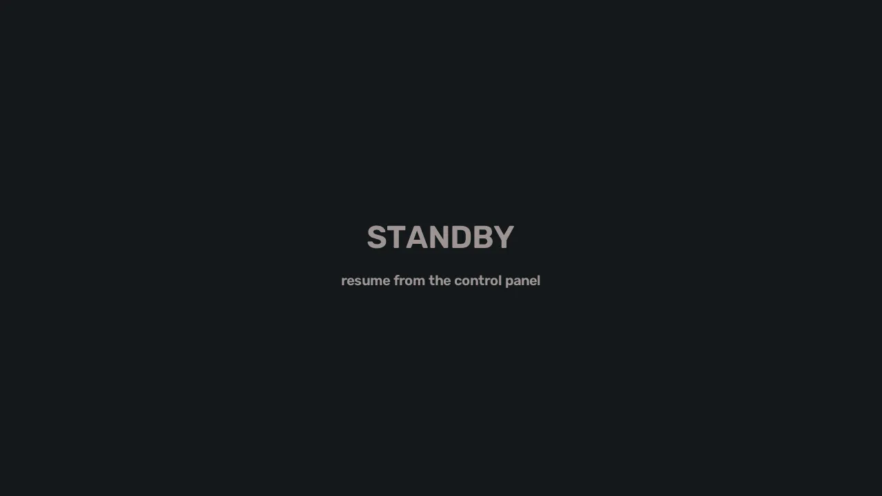 The STANDBY slate: dark grey frame with the word STANDBY and 'resume from the control panel' underneath